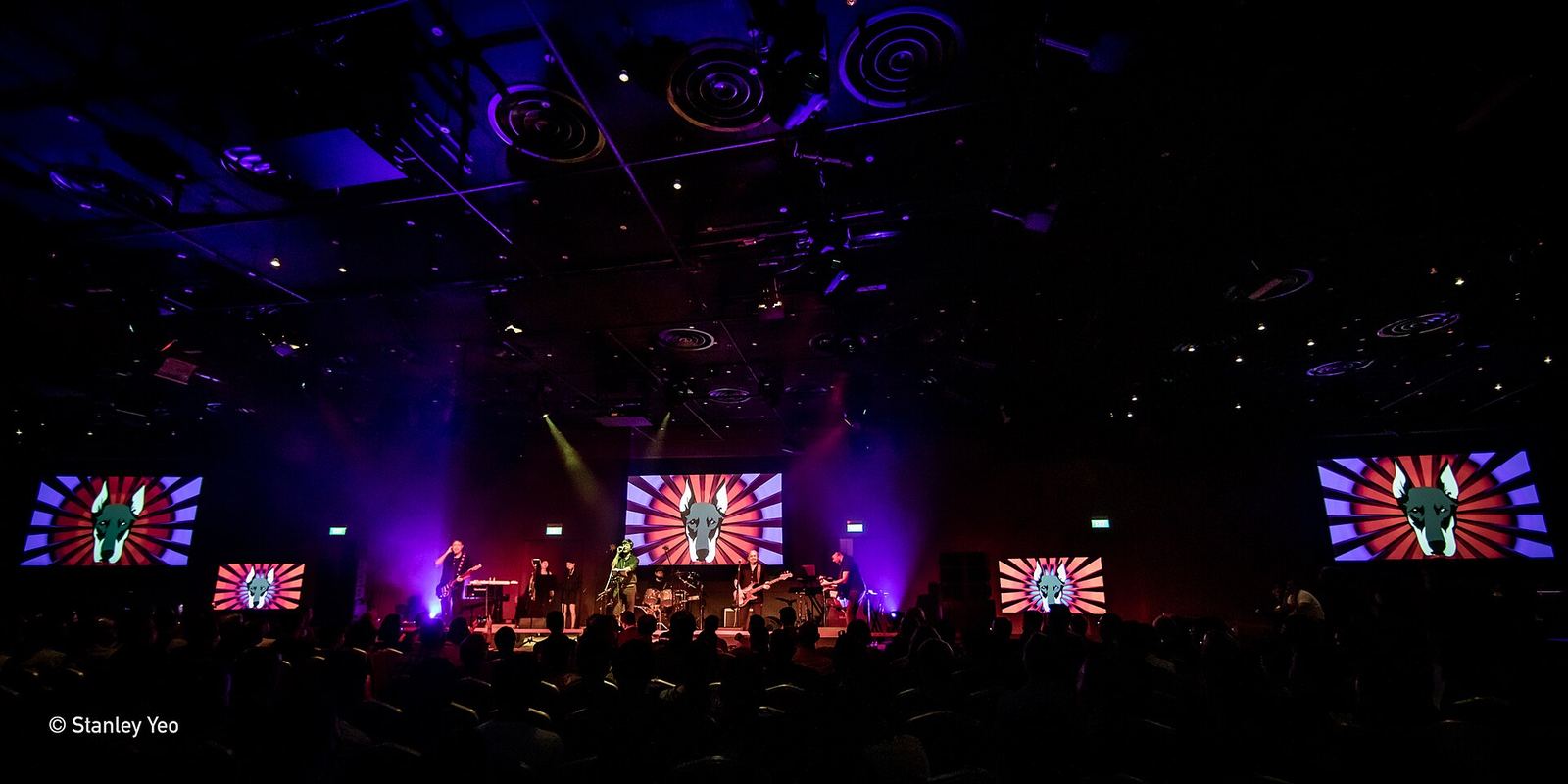 A band on a lit stage
